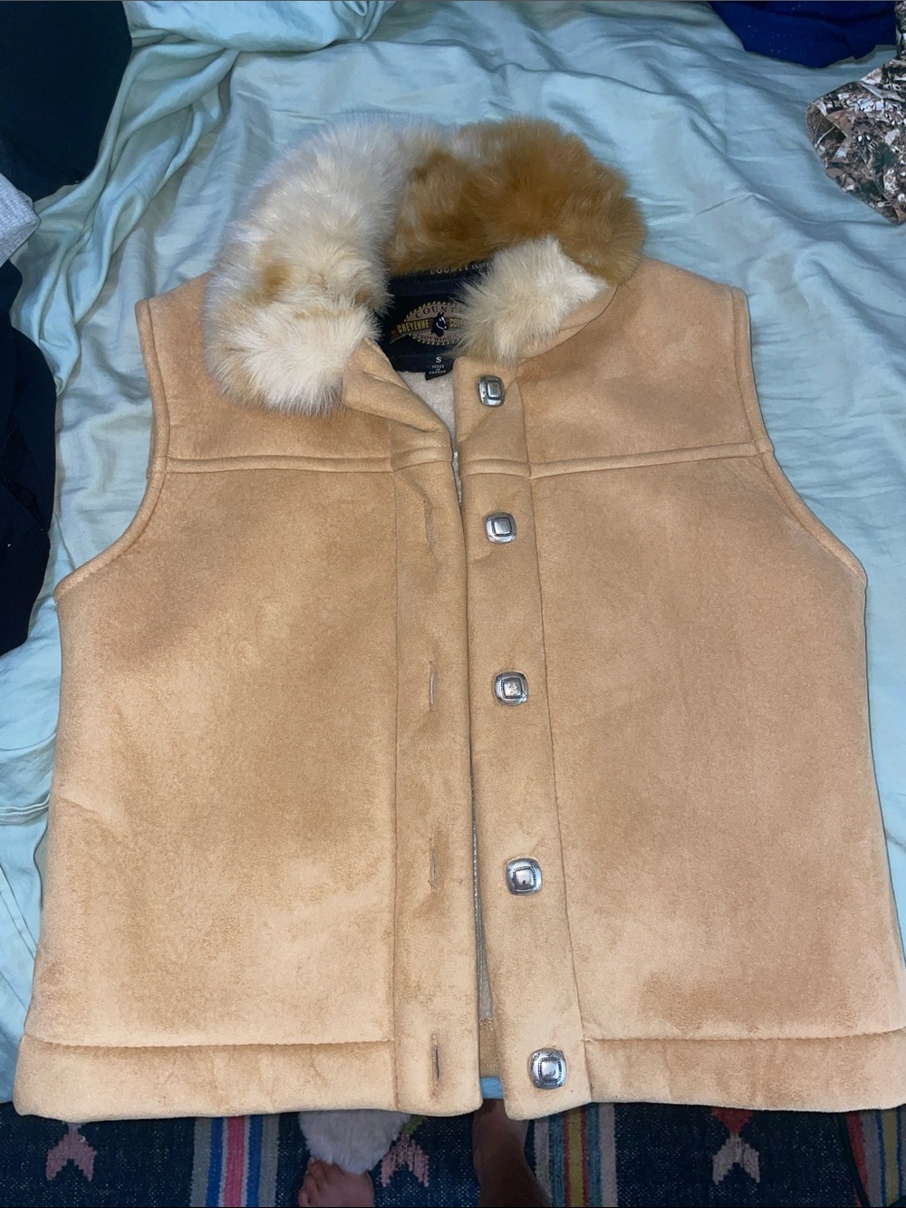 Tan suede vest with faux fur
